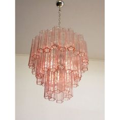 a pink chandelier hanging from the ceiling