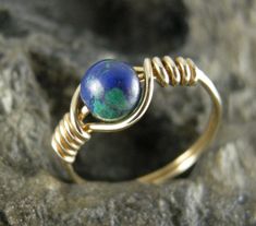 This Wire Wrapped Ring is handmade to a ring sizes 6 1/4, 7 1/2  with 20 gauge 14 k gold Filled Round Wire. The Stone is a 6 mm Green and Blue Azurite Bead Wire Wrapped Engagement Ring, Wrapped Engagement Ring, Engagement Ring Wraps, Friendship Ring, Ring Wire, Friendship Rings, Wire Wrapped Rings, Ring Promise, Ring Sizes