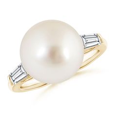 Exuding sophisticated allure, this 14k yellow gold ring is a stunner. Glittering baguette diamonds flank the glorious South Sea cultured pearl and lend distinctive charm to the design. South Sea Pearl Ring, Cultured Pearl Ring, Baguette Diamonds, 14k Rose Gold Ring, Sea Pearl, 18k Yellow Gold Ring, South Seas, South Sea Pearls, Baguette Diamond