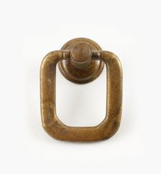 an old brass door handle on a white background