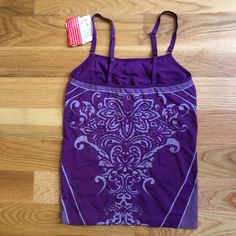 Gorgeous Purple Pattern, Perfect For Spring . New With Tags. Seamless. Make Me An Offer Training Tops With Built-in Bra In Seamless Fabric, Purple Seamless Sleeveless Activewear, Purple Sleeveless Seamless Activewear, Fitted Seamless Yoga Tank Top, Fitted Seamless Tank Top For Yoga, Seamless Yoga Tops Bra Friendly, Medium Support Seamless Tank Top For Yoga, Racerback Yoga Top In Seamless Fabric, Seamless Racerback Tops For Training