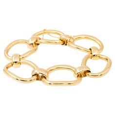 Yellow gold bracelet 750 thousandths (18 carats). large mesh. length: 20.0 cm. width: 2.14 cm. thickness: 0.34 cm. total weight: 83.24 g. clasp with safety chain. owl hallmark. excellent condition