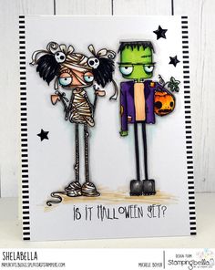 a handmade halloween card with two cartoon characters