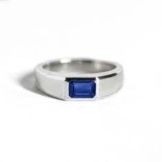 Iconic jewelry makes a bold statement. Shop the fine jewelry brand redefining the industry with engagement rings for men handcrafted with gold, diamonds, and sapphires. Sapphire Ring Men, Sapphire Signet Ring, Wide Engagement Ring, Mens Diamond Band, Wedding Ring Styles, Wedding Day Jewelry, Baguette Cut Diamond