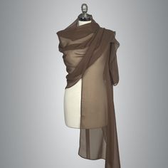 A very elegant and luxury shawl for your wedding dress made of the finest crepe chiffon Color: brown taupe Size : 200 x 50 cm ( approx) You can wear it on your shoulders or you can use any brosche to close it. More colors available, please ask. Luxury Shawl, Wrap Shrug, Bridesmaid Wrap, Evening Dress Wedding, Brown Shawl, Dress Bridesmaids, Taupe Dress, Chiffon Shawl, Chiffon Wrap