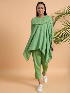 Green Asymmetrical Cotton Top with Tassels By The Neem Tree now available at Trendroots Spring Long Sleeve Kurta With Tassels, Spring Cotton Sets With 3/4 Sleeve, Spring Cotton Tunic Set, Cotton Kurties, Casual Cotton Top, Tunic Designs, Asymmetric Top, Linen Fashion, Kurta Designs Women