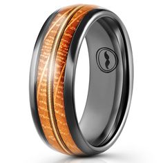 a wedding ring with wood inlays