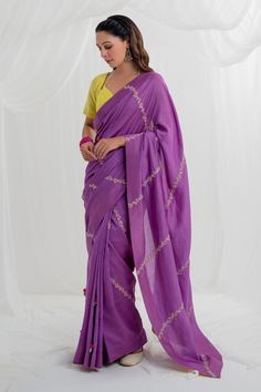 Purple chanderi saree with floral resham and 3D embroidery. Paired with a yellow short sleeve blouse. 
Components: 2
Pattern: Embroidered
Type Of Work: Hand and machine embroidery
Fabric: Chanderi
Color: Purple
Other Details: 
Floral and 3D embroidery
Back tie-up blouse
Occasion: Mehendi and Haldi - Aza Fashions Festive Floral Embroidered Raw Silk Pre-draped Saree, Transitional Pre-draped Saree With Floral Embroidery, Unstitched Purple Pre-draped Saree With Dori Work, Purple Pre-draped Saree With Dori Work, Bollywood Pre-draped Saree With Floral Embroidery For Navratri, Designer Bollywood Pre-draped Saree With Floral Embroidery, Transitional Floral Embroidered Saree, Purple Unstitched Cotton Silk Saree, Unstitched Purple Cotton Silk Saree