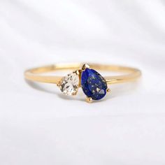 Natural Lapis Lazuli Promise Ring Women Diamond Toi ET Moi Ring Unique Design Engagement Ring Art Deco Gold Ring Birthday Gift For Daughter Maine Stone - Lapis Lazuli Stone Creation -(Natural) Stone Shape - Pear Cut  Stone Color - Blue Stone Size - 6x5 mm Second Stone -CZ Diamond Stone Shape - Pear Stone Color - Colorless Features: * Handmade * Ready To Ship * Brand New * All Ring Sizes Available * Suitable For Every Day * 14k Solid Gold / 18k Solid Gold / Gold Filled Over Sterling Silver * Purity Stamped * Fits True to Size * High Quality * Available Color: Rose Gold, Yellow Gold, White Gold * Band width : 2.5 mm ✦ feel free to contact me if you have any questions or you are interested in bulk order or custom order. ✦ Gemstone color may slightly vary from listed image due to the nature of Lapis Lazuli Engagement Ring, Design Engagement Ring, Ring Unique Design, Birthday Gift For Daughter, Art Deco Gold, Engagement Ring Art Deco, Lapis Lazuli Ring, Lapis Lazuli Stone, Birthday Ring