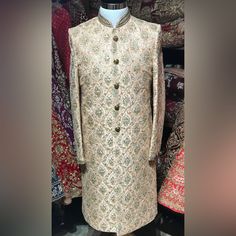 Beautifully Embroidered Blush Sherwani From Nazranaa. It Has Never Been Worn So Is Basically Brand New. It Comes With Matching Pants. Perfect For An Elegant Indian Wedding Or Party. No Transactions Outside Poshmark App - I Will Not Text Or Email To Process Orders. Traditional Jamawar Wear With Dabka Work For Reception, Traditional Unstitched Dabka Suit For Reception, Traditional Unstitched Suit With Dabka For Reception, Elegant Embroidered Jamawar Bandhgala, Traditional Wedding Wear With Dabka On Jamawar, Embroidered Jamawar Sherwani With Traditional Drape, Long Sherwani In Raw Silk With Resham Embroidery, Bollywood Style Naqshi Salwar Kameez For Formal Occasions, Long Raw Silk Sherwani With Resham Embroidery