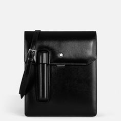 Marking the 100th anniversary of the Meisterstück, this messenger bag, crafted from luxurious black leather, is a testament to timeless design. A steadfast companion for daily endeavours, it features an exterior case for a writing instrument – a tribute to design of vintage pen pouches. The interior is thoughtfully organised with open pockets that ensure every small item has its place. Designed for comfort, it can be worn over the shoulder or across the body, facilitating effortless mobility. Please note that this product contains magnets. Before using it, please consult the magnet section in the Service Guide leaflet accompanying the product or the Customer Service section on the Montblanc website. If you have any concerns, please consult your health care professional. High-end Black Briefcase, High-end Black Leather Briefcase, Black Briefcase With Palladium Hardware For Evening, Luxury Black Shoulder Bag With Case, Black Briefcase With Palladium Hardware, High-end Black Briefcase With Palladium Hardware, Timeless Black Rectangular Briefcase, Designer Black Shoulder Bag With Smooth Grain, Designer Black Rectangular Briefcase