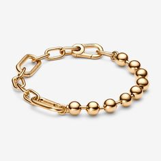 The Pandora ME Metal Bead & Link Chain Bracelet proves that opposites attract. Pairing two essential styles – metal beads and chain links – this 14k gold-plated bracelet can be customised by styling the links with mini dangle charms or medallion charms. Balancing 90s punk rock influences with the timelessness of warm gold tones, this statement bracelet can stand alone or be layered and styled in fresh ways every day. - Pandora ME Metal Bead & Link Chain Bracelet - 14k Gold-plated unique metal bl 90s Punk Rock, Charms Disney, Pandora Me, 90s Punk, Charms Pandora, Bracelet Pandora, Metal Bead, Link Chain Bracelet, Opposites Attract