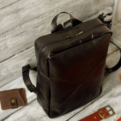 Special offer 🔥 Buy 2 or more products and get a 45% OFF. 🔥 This leather envelope backpack is the perfect for both work and travel. The front of the backpack features a design with four triangles that converge towards the center, giving the design a resemblance to an envelope. The rectangular shape allows you to conveniently carry a laptop or documents. The backpack has a phone pocket on the back side. Inside, the backpack has one large compartment. Comfortable adjustable shoulder straps make Rectangular Leather Backpack For Commuting, Soft Leather Rectangular Backpack For Commuting, Rectangular Soft Leather Backpack For Commuting, Soft Leather Commuting Backpack, Leather Backpack Men, Men Backpack, Leather Backpack For Men, Backpack Laptop, Leather Envelope