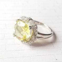 Genuine Lemon Quartz- Outstanding Color And Clarity Excellent Yellow Or Canary Diamond Alternative Genuine White Zircon Halo Sterling Silver Setting, Stamped 925 Never Worn, Nwot Size 7 This Ring Is Incredible! Yellow Citrine Ring With Halo Setting, Yellow Sterling Silver Ring With Halo Setting, Yellow Sterling Silver Rings With Halo Setting, Yellow Sterling Silver Rings With Diamond Accents, Canary Diamond, Diamond Alternatives, Zircon Ring, Lemon Quartz, Ring Size 7