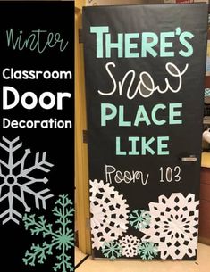 there's snow door decoration and classroom door sign in front of the door for winter