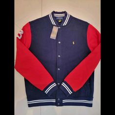 Polo Ralph Lauren Vintage 1990s Blue And Red Jacket Casual Blue Varsity Jacket For Winter, Sporty Ralph Lauren Fall Outerwear, Casual Blue Varsity Jacket, Casual Blue Hooded Varsity Jacket, Casual Red Outerwear With Ribbed Collar, Blue Casual Varsity Jacket With Pockets, Casual Blue Varsity Jacket With Pockets, Sporty Navy Outerwear For School, Red Casual Varsity Jacket With Pockets