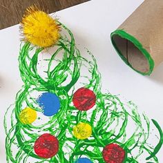 a child's christmas tree made out of construction paper and colored crayons