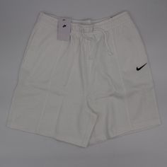 Nike Women's Sportswear Hi Rise Loose Fitwhite Fleece Short Color: White Heavy-Weight Cotton Blend Fleece Cut High Waist Lounge-Ready Fit 2 Side Pockets Machine Washable 80%Cotton, 20%Polyester Elastic And Drawstring Closure Measurement: Us Medium: Waist 32"(Unstretched)/ Rise 14"/Inseam 6.5"/Leg Opening 30"/Outseam 20.5" Measurement: Us Large: Waist 35"(Unstretched)/ Rise 15"/Inseam 6.75"/Leg Opening 30"/Outseam 21.25" Measurement: Us Small: Waist 28"(Unstretched)/ Rise 14"/Inseam 6.25"/Leg Ope Sporty Workout Sweats For Spring, Casual Cotton Sweats For Sports, Nike Cotton Sweats For Spring, Comfortable White Sports Sweats, Casual Cotton Sweats For Gym, Sportswear Sweats With Drawstring For Sports, White Sportswear Shorts For Sports Season, Nike Fleece Casual Activewear, Casual Nike Fleece Activewear