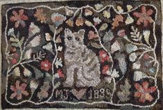 an old rug with a cat on it