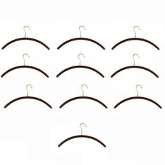 twelve pairs of brown wooden hangers