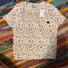 Nw Floral Baby Tee. Size Small, Fits More Like An Xs But It’s Stretchy Material. White Floral Print Crew Neck Top, Casual White Tops With Floral Print, Red Floral Print Crew Neck Blouse, Red Crew Neck Blouse With Floral Print, Cute Red Crew Neck Top, Red Printed Short Sleeve Top, Red Short Sleeve Top With Floral Print, Red Short Sleeve Tops With Floral Print, Red Floral Print Cotton T-shirt