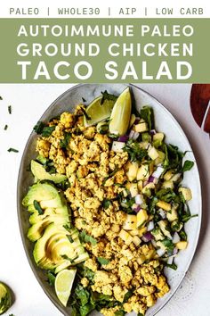 a plate filled with salad and topped with avocado