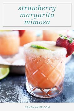 strawberry margarita mimosa with lime and mint garnish