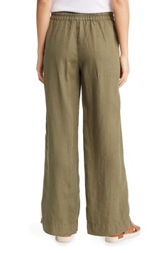 Crafted from lightweight linen, these tie-waist pants feature breezy wide legs for vacation-ready vibes. 30 1/2" inseam; 22" leg opening; 11 1/2" front rise; 17" back rise (size Medium) Elastic/drawstring waist Side-seam pockets 100% linen Machine wash, line dry Imported Linen Bottoms With Tie Waist And Straight Leg, Green Linen Beach Pants, Green Relaxed Fit Wide Leg Vacation Pants, Linen Trousers With Tie Waist, Green Relaxed Fit Wide Leg Pants For Vacation, Wide Leg Linen Pants With Tie Waist, Green Wide Leg Pants Relaxed Fit For Vacation, Green Linen Bottoms For Vacation, Vacation Linen Wide-leg Bottoms