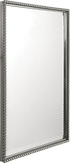 a silver framed mirror with beaded trim around the edges and an ornate border at the edge