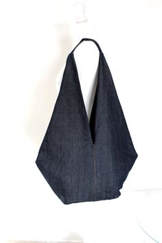 Denim Blue Large Capacity Cotton Shoulder Bag, Denim Blue Cotton Shoulder Bag, Denim Rectangular Hobo Bag, Denim Blue Cotton Shoulder Bag With Zipper Pocket, Daily Use Dark Wash Cotton Shoulder Bag, Rectangular Cotton Hobo Bag With Pockets, Everyday Dark Wash Cotton Shoulder Bag, Modern Cotton Shoulder Bag With Pockets, Trendy Rectangular Cotton Hobo Bag