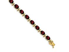 14k yellow gold 16 cttw garnet bracelet. Measures approximately 3/16 of an inch in width and has a box catch closure. Formal Ruby Jewelry With Faceted Details, Elegant Garnet Bracelets For Formal Occasions, Formal Garnet Faceted Jewelry, Formal Faceted Garnet Jewelry, Elegant Red Gold Bracelet For Formal Occasions, Faceted Garnet Jewelry In Yellow Gold, Faceted Bracelet Jewelry For Formal Occasions, Formal Garnet Gemstone Bracelets, Classic Gold Ruby Tennis Bracelet