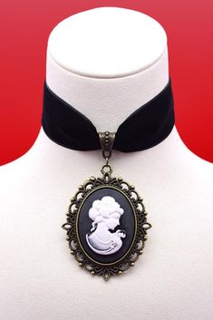 The VICTORIAN Velvet choker necklace with large antique bronze cameo pendant in a choice of black, moss or copper. Pendant size - 6.1cm height x 4.9cm width Choker width - 2.5cm Choice of choker lengths Extender chain - 5cm long Chokers are handmade to order so if you require any customisation please get in touch. Your order will arrive complete with velvet gift bag. Free UK delivery & combined shipping discounts on international orders! Cameo Choker Necklace, Cameo Choker, Victorian Cameo, Velvet Choker Necklaces, Velvet Choker, Cameo Pendant, Choker Necklaces, Antique Bronze, Gift Bag