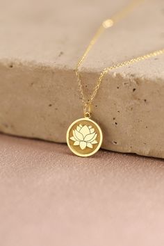 Gold Water Lily Pendant - Lotus Gold Necklace ● Material of pendant: Solid Gold 14k ( REAL GOLD ) ● Metal Stamp: 14k ( REAL GOLD ) ● The pendant is available in 5 sizes: - 12,7 mm / 0.5 inches (Diameter) - 14,0 mm / 0,55 inches ( Diameter ) In the photos - 15,3 mm / 0.6 inches ( Diameter ) - 16,5 mm / 0,65 inches ( Diameter ) - 19,1 mm / 0,75 inches ( Diameter ) ( In the photos the size is 14mm / 0.55 inches Diameter ) ( Jump Ring inner diameter: 4 mm ) ● Material of chain: Solid gold 14k ( REAL Gold Spiritual Necklace With Birth Flower, Spiritual Gold Charm Necklace For Birthday Gift, Spiritual Gold Charm Necklaces For Birthday Gift, Gold Hallmarked Flower-shaped Jewelry, Spiritual Round Charm Necklaces In Rose Gold, Gold-plated Birth Flower Jewelry For Mother’s Day, Gold Plated Birth Flower Jewelry For Mother's Day, Spiritual Flower Pendant Necklace Gift, Rose Gold Birth Flower Jewelry Gift