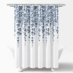 a shower curtain with blue and white confetti sprinkles on it