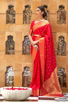 Product Description: Enhance your traditional wardrobe with this stunning pure Kanjivaram silk saree, designed for special occasions like weddings, festivals, and celebrations. This rich, handwoven saree comes in an eye-catching vibrant red shade, adorned with intricate gold zari work that adds a regal touch. The saree features delicate floral and paisley motifs, expertly crafted by skilled artisans, making it a perfect choice for a bridal or festive look. The saree drapes beautifully and is lightweight, offering a luxurious feel while maintaining comfort. The rich border and pallu enhance the overall elegance of the saree, making you stand out in any gathering. Pair it with traditional jewelry to complete your elegant and timeless appearance. - Material : Pure Kanjivaram Silk - Color : Re Saree With Belt, Kanjivaram Sarees Silk, Perfect Blouse, Chique Outfits, Party Kleidung, Sari Blouse, Red Saree, Art Silk Sarees, Kanjivaram Sarees