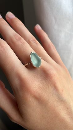 What mermaid dreams are made of! Handmade sea glass ring in a .925 sterling silver and fine silver bezel cup that is attached to a sterling silver ring band. Sea glass picked from beaches in California.  These rings are semi custom and made from scratch after you order. Keep in mind that it will take a week minimum, and most likely longer for you to receive your ring. Choose from the sea glass pieces available. The letters in the drop down menu match the sea glass letters in the photo. Rings wil Silver Recycled Glass Ring, Silver Sea Glass Ring For Beach, Adjustable Silver Ring With Sea Glass, Handmade Sea Glass Ring Jewelry, Ocean-inspired Sterling Silver Rings, Handmade Silver Rings With Ocean-inspired Style, Beaches In California, Jewelry Making Rings, Silver Ring Band