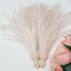 Very light ivory feather earrings. Ideal for evening,weddings, parties, proms, photo shoots and on every day. Earrings made of high-quality an ostrich feather and Czech round beads If you wish, i can produce for you this model of earrings in any length or color range. Length -12cm (5.0 inch) Thank you for visiting my shop. Hope you will find something interesting and beautiful for yourself in my shop. If you have any questions don't be hesitate to ask me. --- Please note that due to lighting eff Elegant Cream Earrings For Party, Elegant Beige Earrings For Wedding, Elegant Feather Drop Earrings, Elegant Feather Earrings For Gift, Elegant Feather Jewelry For Evening, Cream Drop Earrings For Parties, Beige Drop Earrings For Wedding, Elegant Evening Jewelry With Feathers, Elegant White Feather Earrings