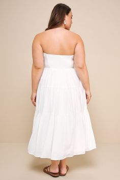 It's easy to fall in love with your reflection when you're wearing the Lulus Sweetness and Sunshine White Strapless Midi Dress With Pockets! Lightweight woven fabric shapes this essential summer dress that has a strapless bodice (with hidden no-slip strips) and a seamed bodice. High waist tops a tiered skirt (with side seam pockets) that features a decorative button placket, running from the neckline to the midi hem. Smocked panel at back for fit. Fit: This garment fits true to size. Length: Mid