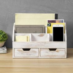 a wooden desk organizer with two drawers