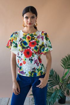 Juniper Floral Top - Vienna Bloom Playful Fitted Tops For Day Out, Multicolor Short Sleeve Knit Top For Spring, Relaxed Fit Multicolor Patterned Top, Multicolor Print Top For Day Out In Fall, Multicolor Print Top For Fall Day Out, Colorful Pattern Crew Neck Top, Spring Cotton Tops With Abstract Print, Playful Multicolor Printed Top, White Top With Vibrant Spring Print