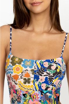 Designed for sun-drenched destinations, the Layla Spaghetti Strap One Piece instantly calls to mind white sandy beaches and romantic sunsets. This one piece is crafted from a quick-drying material with added stretch for comfort and showcases a medley of floral motifs in an eclectic color scheme. Finished with a scoop neck and full coverage at the back, this one piece can be styled with a cover up for a chic post-beach look. Johnny Was Women's Layla Blue Spaghetti Strap One Piece, Size XS, Floral Spring Beach Swimwear With Adjustable Straps, White Strapped Swimwear For Beach, Spring Beach Swimwear With Straps, White Strappy Swimwear For Vacation, Summer Poolside Swimwear With Straps, White Swimwear With Adjustable Straps For Spring, White Tropical Swimwear With Adjustable Straps, Vacation Swimwear With Floral Print And Spaghetti Straps, Beach Swimwear With Removable Spaghetti Straps