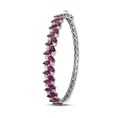 We combined the pear cut and ruby in a bracelet, which is the trend of our days. Material Ruby: 5.69 CT Solid Gold : 10.51 gr Diamond : 1.08 CT E-F / VS-SI Natural Diamond *Returns & exchanges ; Don't worry ,we gladly accept returns and exchanges if you don't like our jewelry. Contact us within: 14 days of delivery Ship items back within: 30 days of delivery Every order you place will be carefully prepared and sent in a durable jewelry box with a lifetime warranty and certificate. ♡ Sincerely Ma Fine Jewelry Red Diamond Bracelet For Formal Occasions, Red Tennis Bracelet With 17 Jewels For Wedding, Formal Red Diamond Jubilee Bracelet, Fine Jewelry Ruby Diamond Bangle Bracelet, Red Diamond Bracelet For Formal Occasions, Formal Gemstone Bangle Tennis Bracelet, Ruby Bracelets Fine Jewelry For Formal Occasions, Formal Ruby Bracelet Fine Jewelry, Ruby Bracelets For Formal Occasions