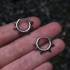 SILVER SPIKE HOOP EARRINGS * 100% Stainless Steel  Details:  * Size: 1.5 mm thickness x 12mm inner diameter. 16 mm outer diameter  * Stainless Steel. 💧 Waterproof. Questions? Message us! Here to help. Trendy Handmade Jewelry For Concerts, Metal Spiked Jewelry For Concerts, Trendy Small Hoop Metal Cartilage Earrings, Trendy Metal Hoop Piercings, Nickel-free Metal Hoop Cartilage Earrings, Trendy Nickel Free Hoop Piercings, Trendy Nickel-free Hoop Piercings, Edgy Hoop Earrings As A Gift, Edgy Single Small Hoop Earring