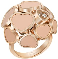 827482-5611 CHOPARD HAPPY HEARTS WOMEN'S LUXURY RING Usually ships within 6 months | Click to View In Stock Jewelry on Sale Store Display Model (What's This?) - Free Overnight Shipping - Ring Size: 53 = 6.5" - Ring Material: 18k Rose Gold - Hearts Material: Reconstructed Rose Stone - Total Diamond Weight: .05 Carat - Total Diamond Quantity: 1 Floating Diamond     Also Known As Model # 827482-5600 Chopard Happy Hearts, Chopard Ring, Rose Stone, Luxury Ring, Gold Hearts, Rose Gold Heart, Heart Women, Luxury Rings, Sale Store