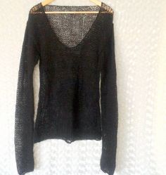 "Long sleeved mohair grunge sweater. Black loose knit sweater for women/men made unisex with delicate see-through texture. The V neck gothic sweater features a soft hand knitted texture with extra long sleeves, see-through knitting and drapes beautifully on most body types. Material : mohair,wool and acrylic mixed yarn. **If you are not sure what size to order, please message me your height and weight during check out; then I can make the perfect fit sweater for you Available sizes and measureme Gothic Sweater, Grunge Sweater, Loose Knit Sweater, Black Grunge, Gothic Clothing, Clothing Gifts, Loose Knit Sweaters, Comfortable Sweater, Custom Clothing