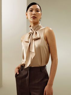 Explore our collection of silk blouses, featuring pleats and a tie-neck design. Perfect for any occasion, from work to weekend outings. Available in a variety of colors. Sleeveless Silk Blouse, Weaving Craft, Silk Pajamas Women, Silk Fashion, Womens Active Wear Outfits, Silk Blouses, Camisole Set, Oversize Fashion, Chic Top