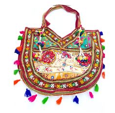 Large Handmade Boho Handbag You are looking at a beautiful Vintage handmade Tassel handbag. This bag has exquisite fine hand embroidery which is not done anymore, Own a piece of the past by acquiring this beautiful exquisite hand embroidered bag. Color: Red, Navy Blue Tassels The whole bag is covered with very unique small stitch embroidery. These are only found on very expensive museum style pieces. Since this is a vintage bag there are a few tell tale signs on the bag as can be seen That also Multicolor Shoulder Bag For Beach Festivals, Handheld Multicolor Bags With Handwork, Traditional Rectangular Beach Bag For Festivals, Multicolor Embroidered Tote Beach Bag, Multicolor Embroidered Beach Bag For Everyday Use, Multicolor Embroidered Tote Shoulder Bag For Beach, Embroidered Multicolor Beach Bag For Everyday Use, Beach Tote Shoulder Bag With Multicolor Embroidery, Traditional Summer Pouch Shoulder Bag