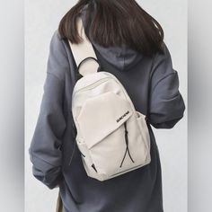 Brand New! Casual, Simple Sling Bag, Backpack For Men And Women. Two Side Pockets, And Has Reflective Strip. Length: 8.5 Inch Height: 12.5 Inch Width: 4.5 Inch Casual Crossbody Backpack With Anti-theft Pocket, Beige Backpack Chest Bag For School, Beige Chest Bag Backpack For School, Beige Chest Backpack For School, Everyday Chest Bag Backpack With Anti-theft Pocket, Casual Chest Bag With Anti-theft Pocket For School, Casual Chest Bag With Anti-theft Pocket, Casual Shoulder Bag With Anti-theft Pocket For School, Casual School Shoulder Bag With Anti-theft Pocket