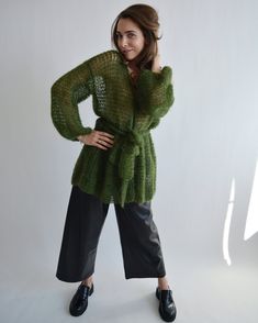 Hello, I'm the one, who won't let you down - green mohair cardigan. I will comfort you, keep you warm and will make you smile. I'm 100% hand made and proud of that. I consist of 80% italian kid mohair and 20% of nylon, which makes me incredibly natural. I'M AVAILABLE IN OTHER COLOURS I'm quite unique as could be worn all year long. I'm in one size and one size fits all because my measurements are : ❤️ Width -52 cm ❤️ Lengths -65 cm If you would like me in other size, you could request a custom o Green Chunky Knit Outerwear For Spring, Green Mohair Winter Cardigan, Green Long Sleeve Open Knit Outerwear, Oversized Green Chunky Knit Cardigan, Wedding Cardigan, Cardigan Short, Cardigan Kimono, Light Cardigan, Belted Cardigan