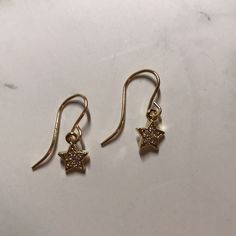 Pave Star Charm On A French Ear Wire. Lightweight And Comfortable To Wear, These Adorable Dangle Earrings Will Be Your New Everyday Favorites! High Quality! 4mm Charm Has Multiple Layers Of Gold Plating Over 925 Sterling Silver. Ear Wires Are Gold Filled, Will Not Turn Or Tarnish. Handcrafted. Star-shaped Earrings With Ear Wire For Everyday, Adjustable Star Earrings For Party, Jewelry Star, Star Charms, Ear Wire, Charm Earrings, Ear Wires, Gold Plating, Handcrafted Jewelry